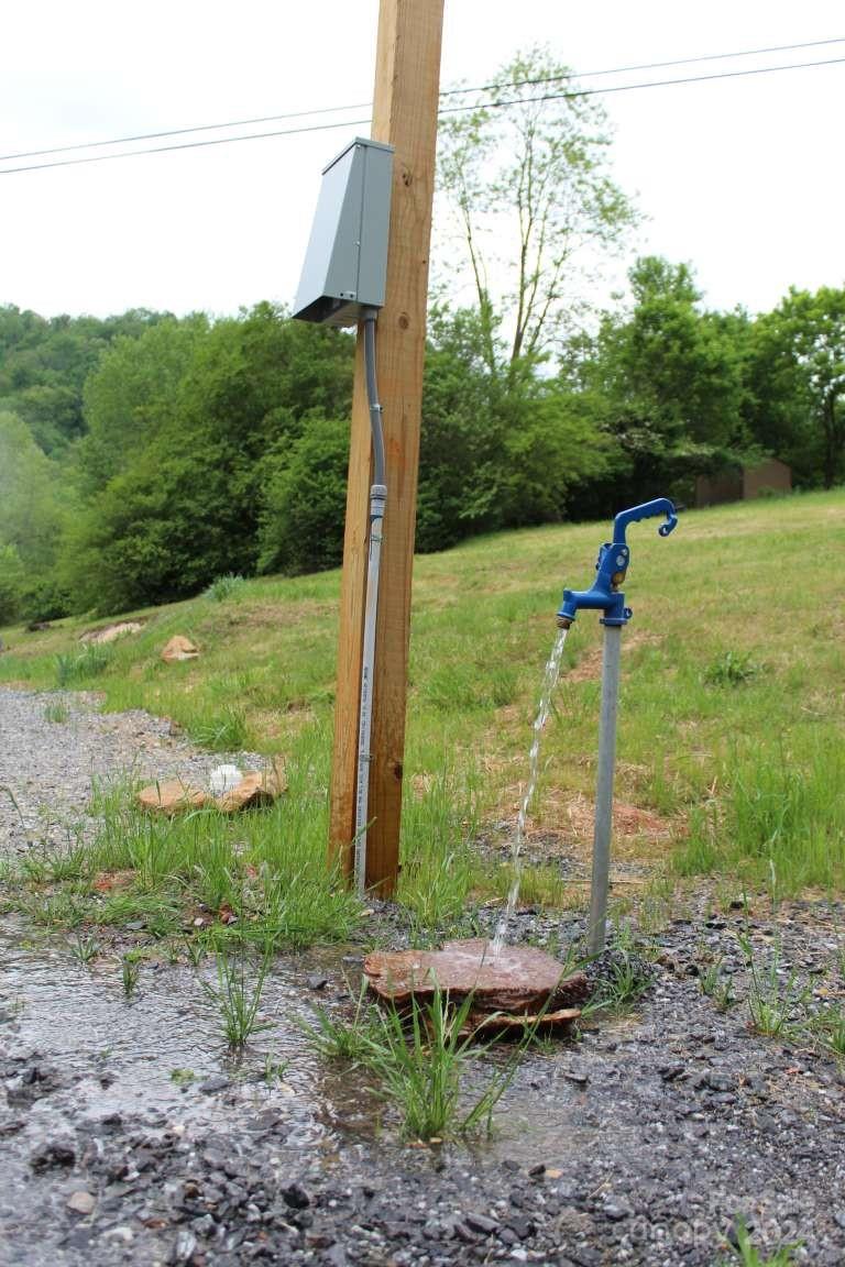 505 Mundy Field Road Canton, NC 28716 - Photo 11 of 22 a backyard of a house with lots of green space