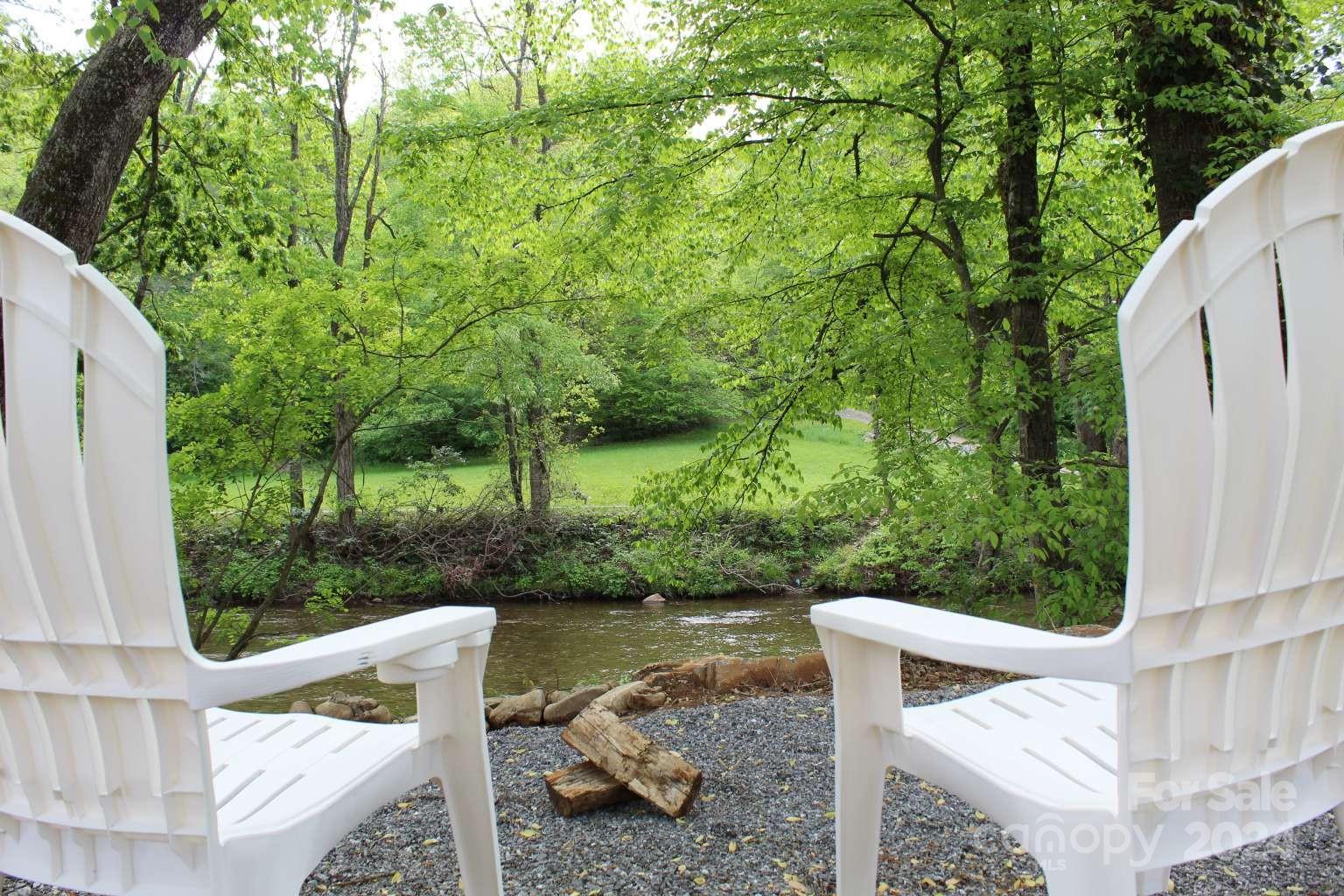 505 Mundy Field Road Canton, NC 28716 - Photo 16 of 22 a view of backyard with roof deck and outdoor seating