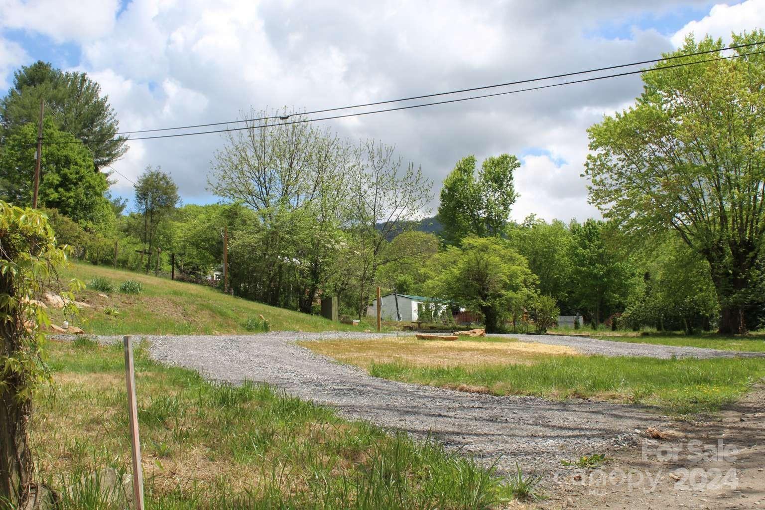 505 Mundy Field Road Canton, NC 28716 - Photo 3 of 22 a view of a yard