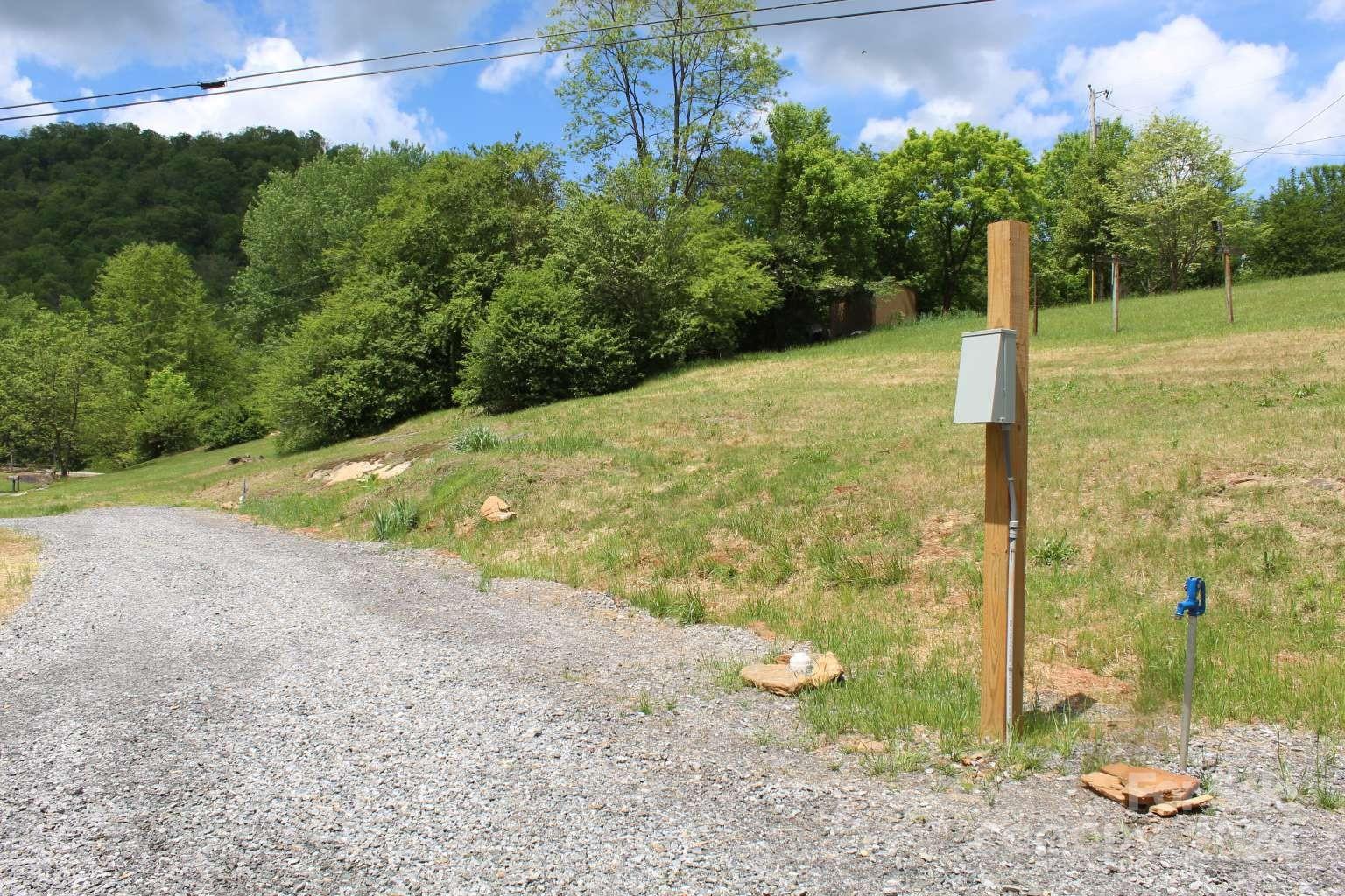 505 Mundy Field Road Canton, NC 28716 - Photo 10 of 22 a backyard of a house with lots of green space