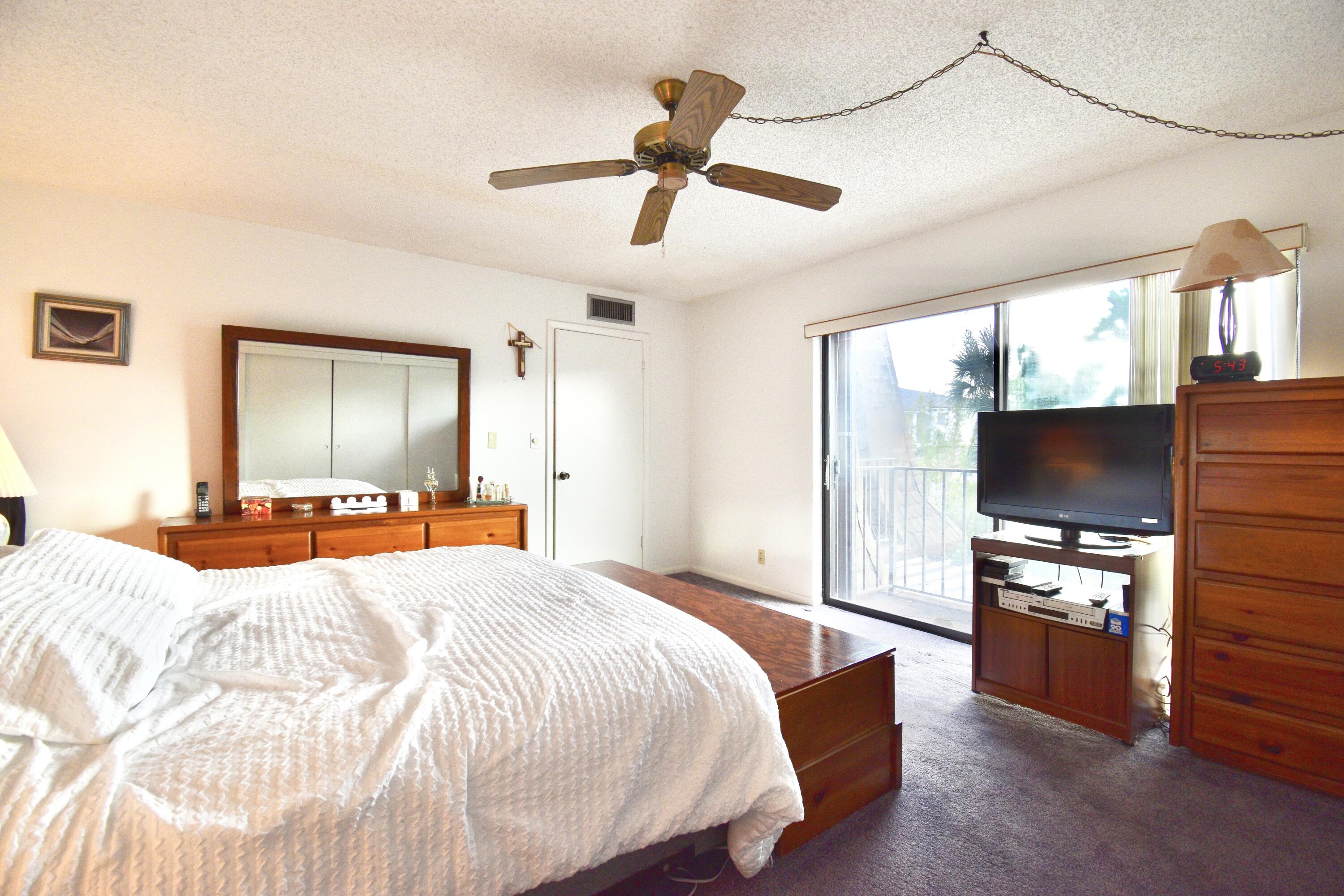 9400 Southwest 61st Way, Unit C Boca Raton, FL 33428 - Photo 18 of 26 Master Bedroom