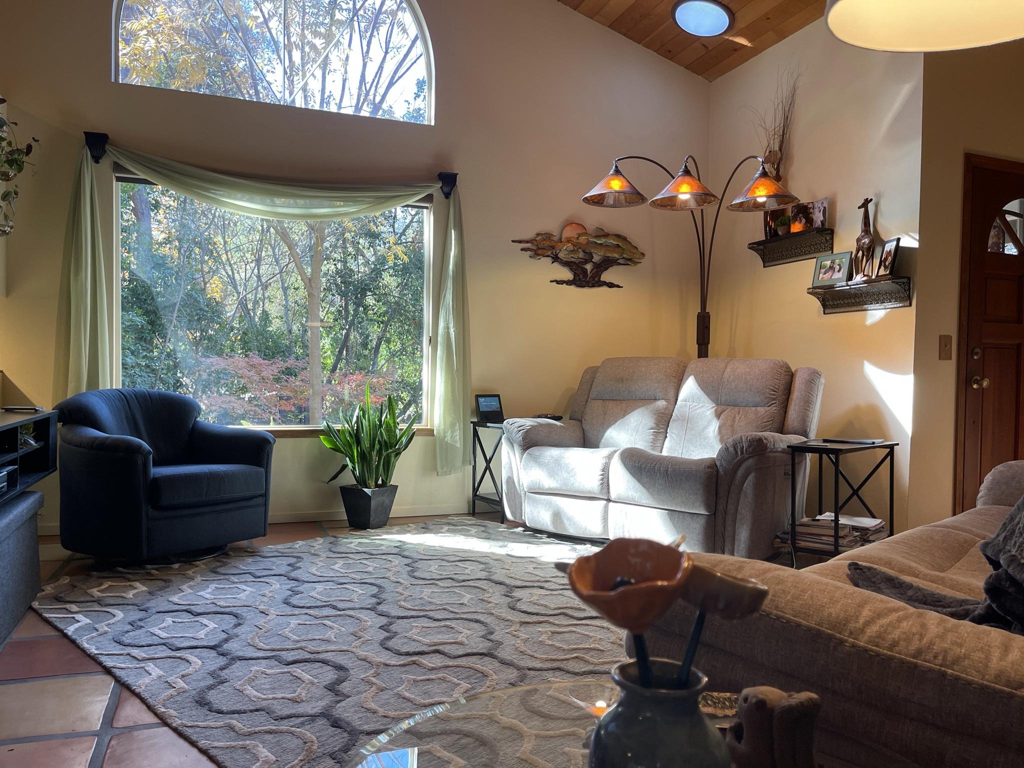 40964 Cherokee Oaks Drive Three Rivers, CA 93271 - Photo 11 of 41 a living room with furniture fireplace and a large window