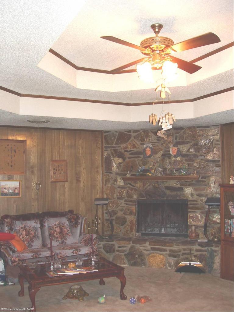 6201 Rutgers Street Amarillo, TX 79109 - Photo 3 of 9 Den w/Fireplace