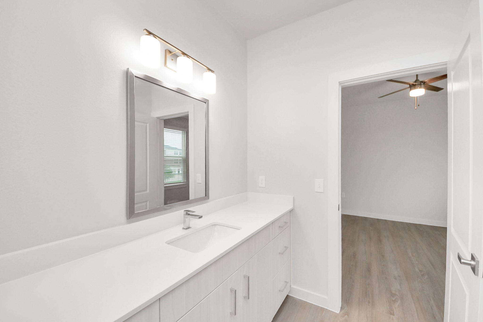 7306 Corey Rushing Lane Richmond, TX 77407 - Photo 17 of 49 Full secondary bathroom with tub/shower combo and vanity area.