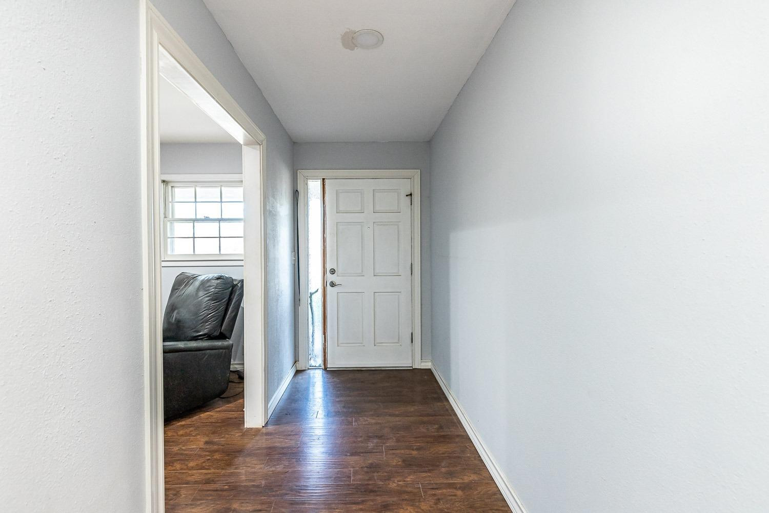 2327 60th Street Lubbock, TX 79412 - Photo 3 of 36 a view of a hallway