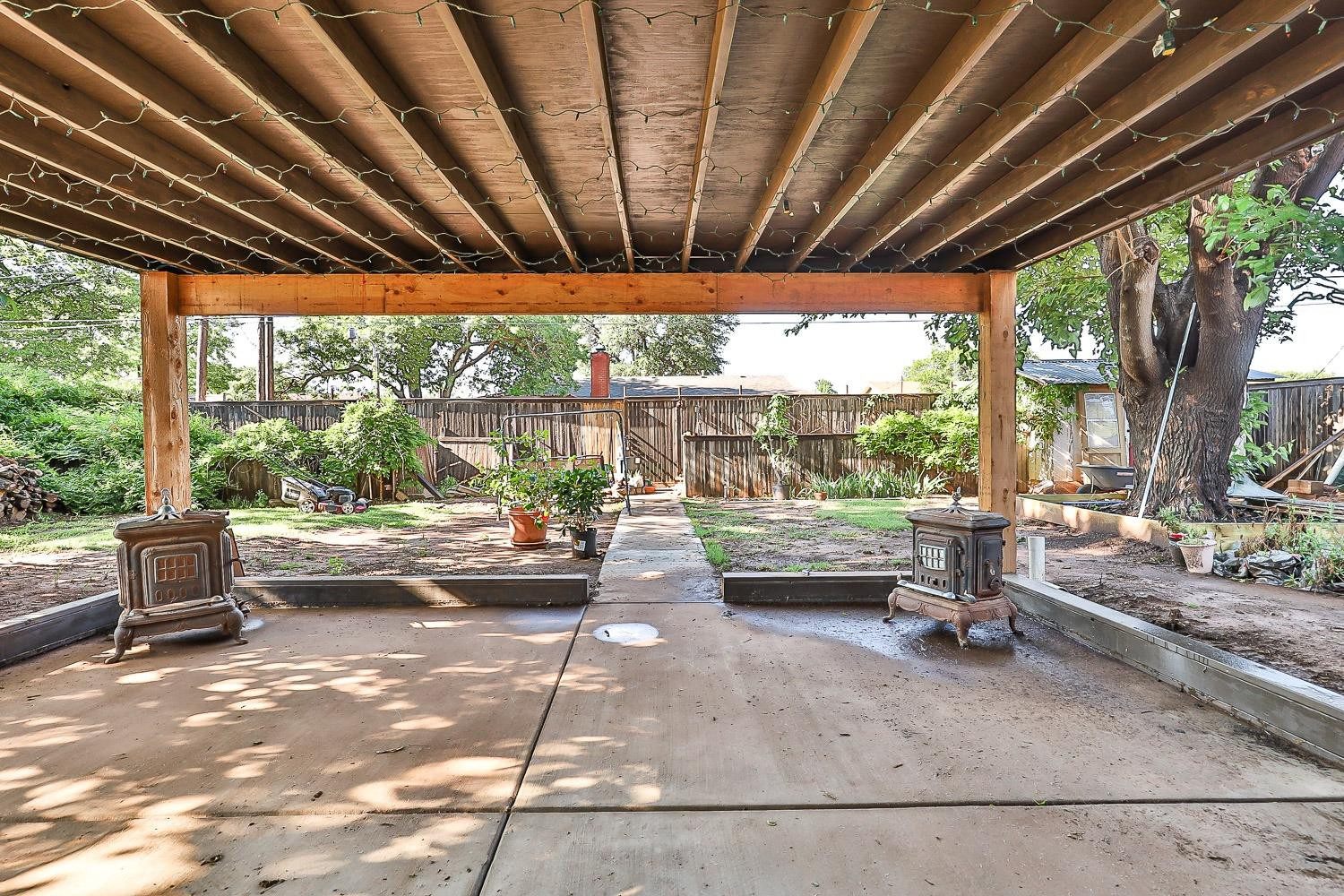 2327 60th Street Lubbock, TX 79412 - Photo 33 of 36 a view of swimming pool with patio