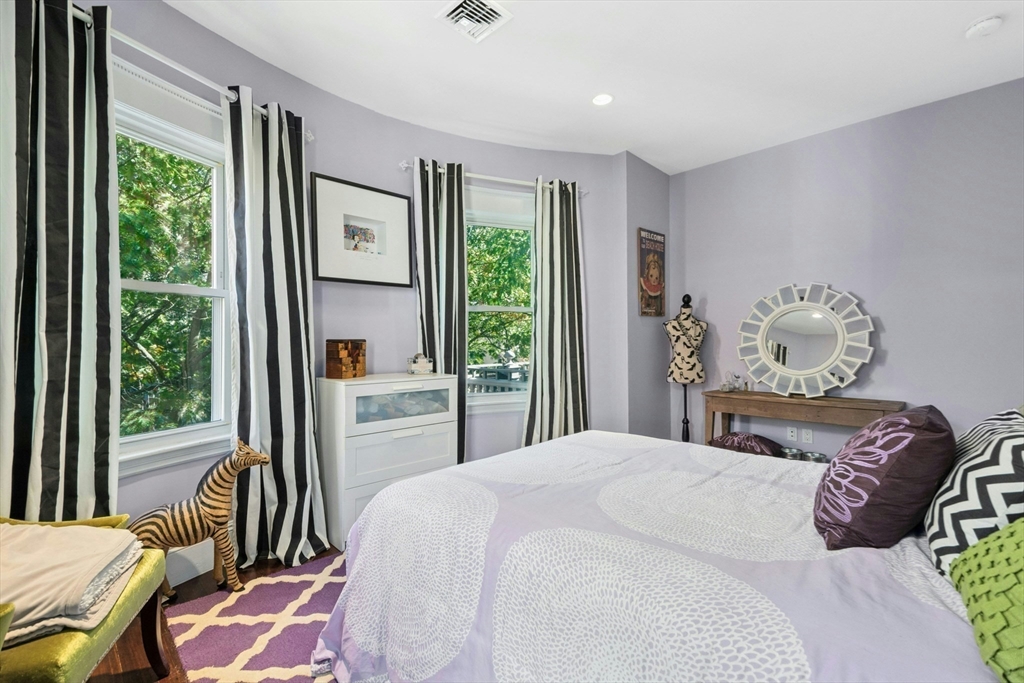 15 Oakview Terrace, Unit 2 Boston, MA 02130 - Photo 12 of 29 a bedroom with a bed and a window