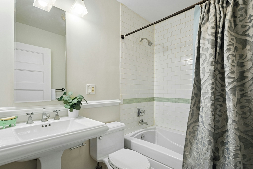15 Oakview Terrace, Unit 2 Boston, MA 02130 - Photo 13 of 29 a bathroom with a sink and toilet