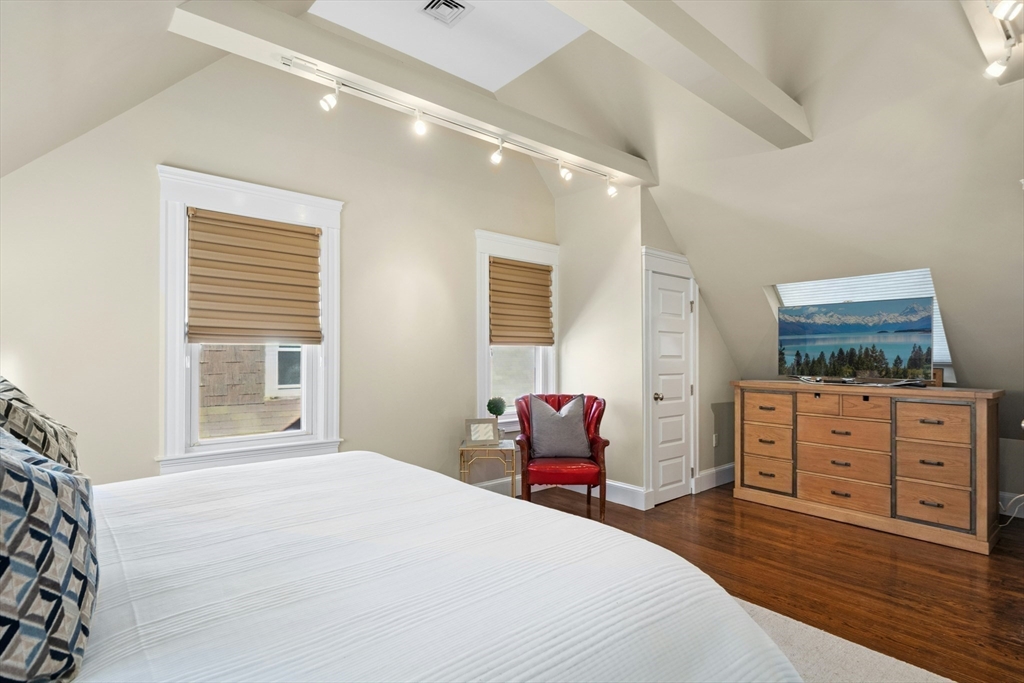 15 Oakview Terrace, Unit 2 Boston, MA 02130 - Photo 18 of 29 a bedroom with a bed and furniture