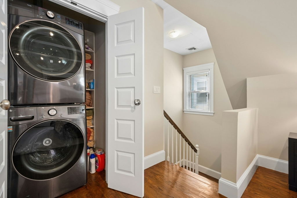 15 Oakview Terrace, Unit 2 Boston, MA 02130 - Photo 19 of 29 a view of a hallway with washer and dryer