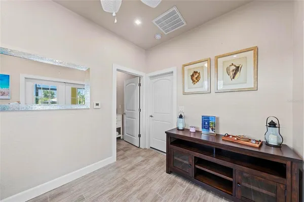 a room with furniture and wooden floor