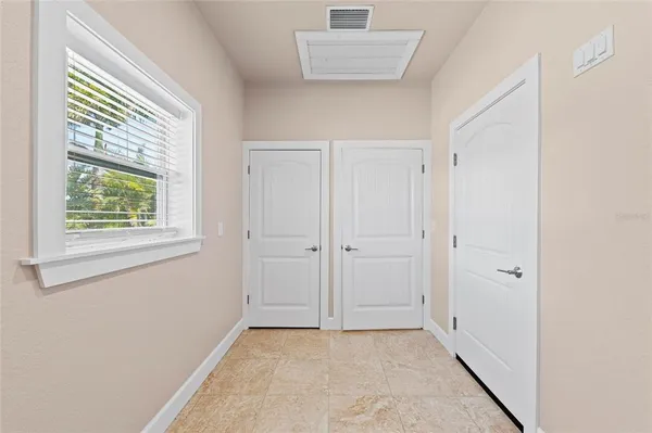 an empty room with windows