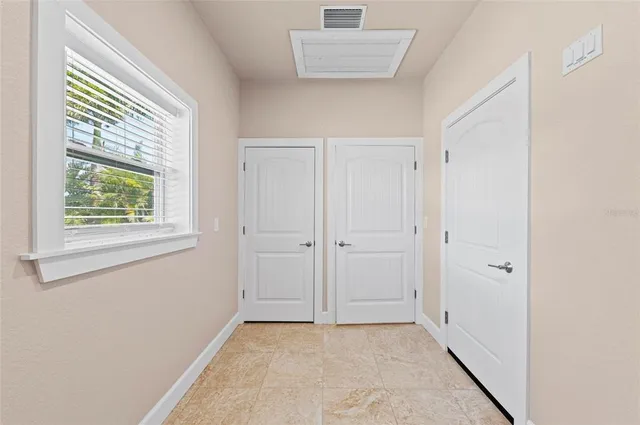 an empty room with windows