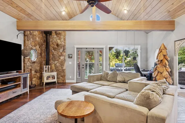a bathroom with a toilet a sink and a mirror