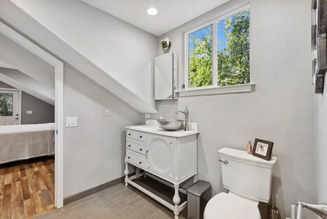 a room with furniture and wooden floor