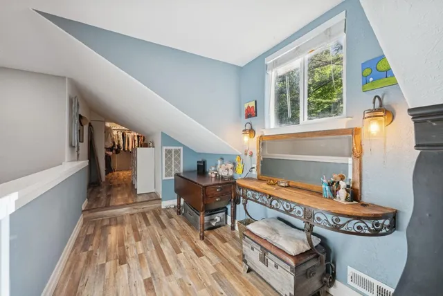a view of a chair and table of the back yard