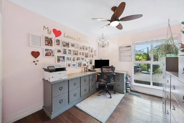 a white toilet sitting next to a small yard