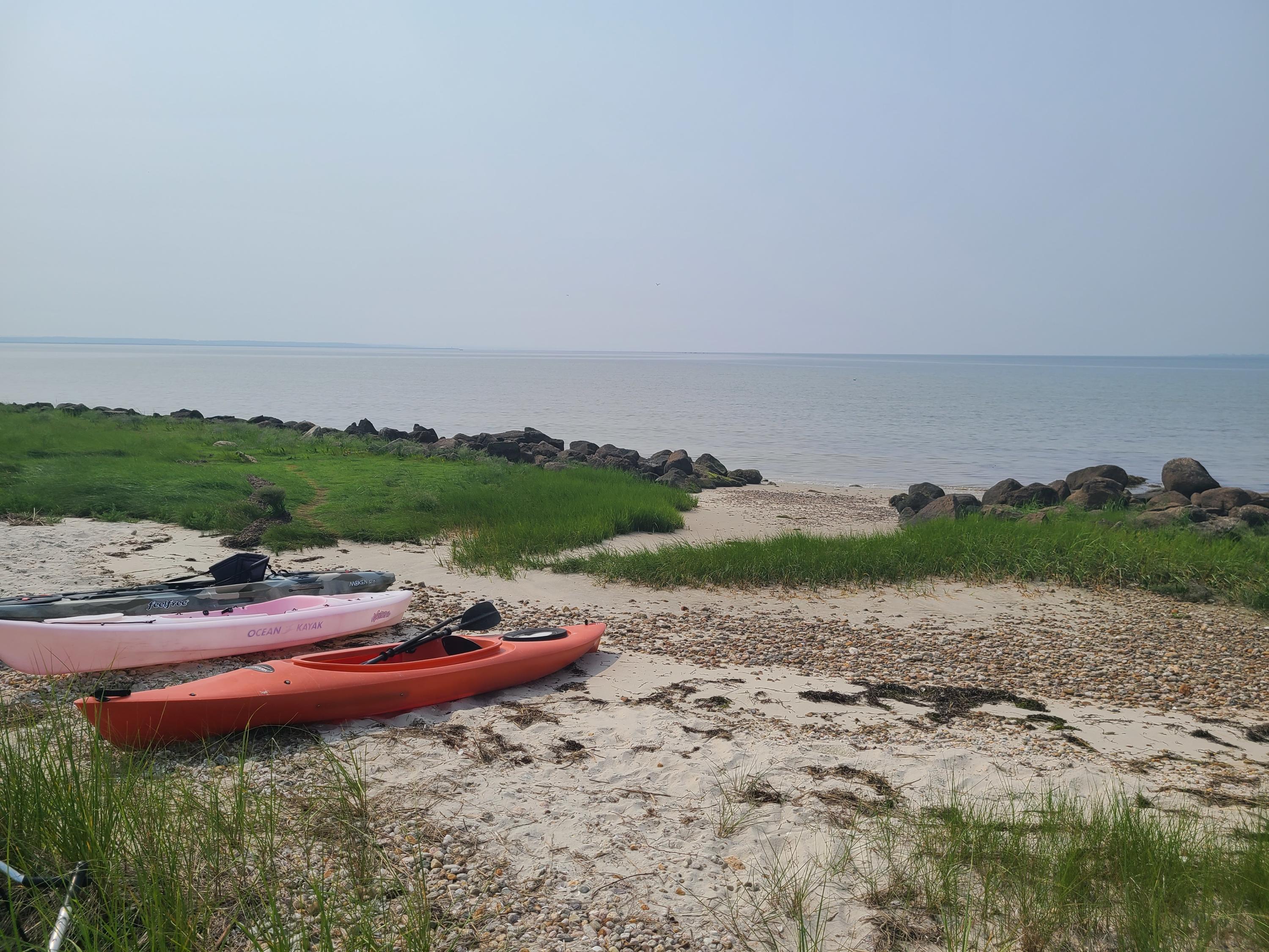 a view of a lake with beach and ocean view
