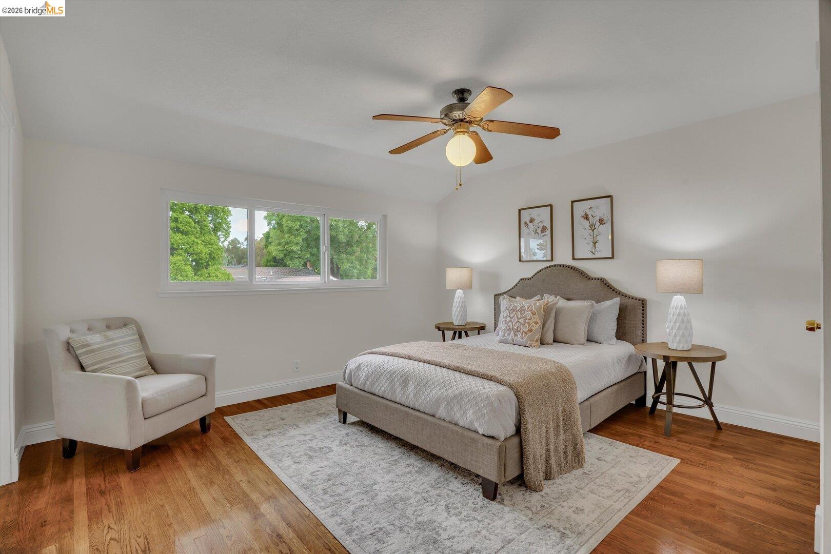 1878 Polk Street Concord, CA 94521 - Photo 20 of 40 a bedroom with a bed and a couch
