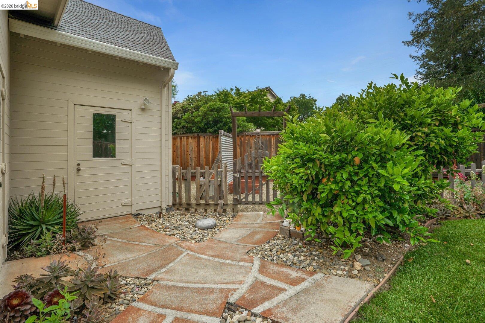 1878 Polk Street Concord, CA 94521 - Photo 34 of 40 a view of a chair and table in the backyard of the house