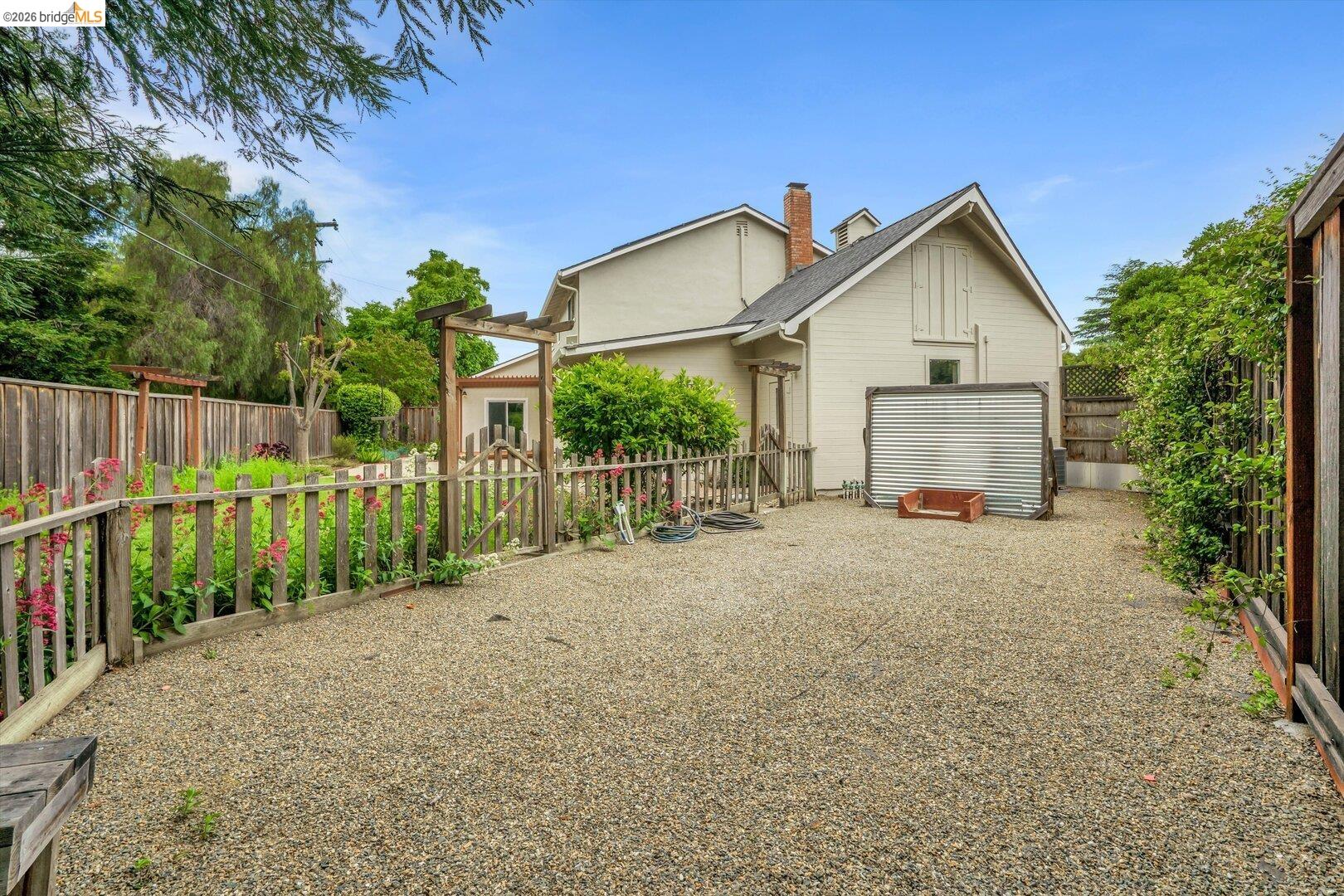 1878 Polk Street Concord, CA 94521 - Photo 36 of 40 a view of a house with wooden fence