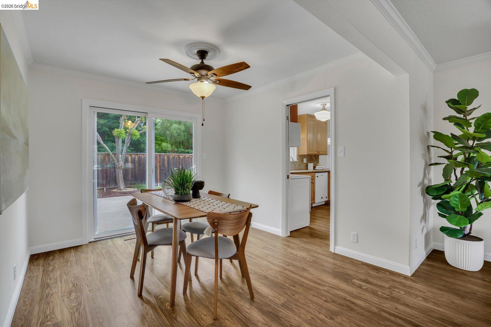1878 Polk Street Concord, CA 94521 - Photo 7 of 40 a view of a dining room with furniture window and wooden floor