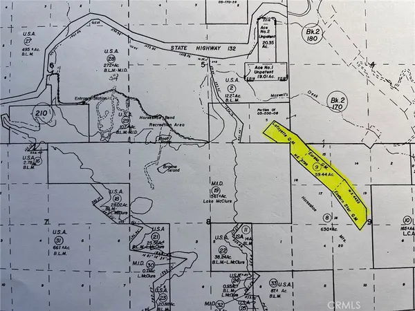 a view of a wall with paintings on the wall