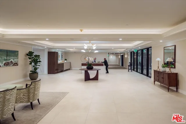 a room with furniture and a large window