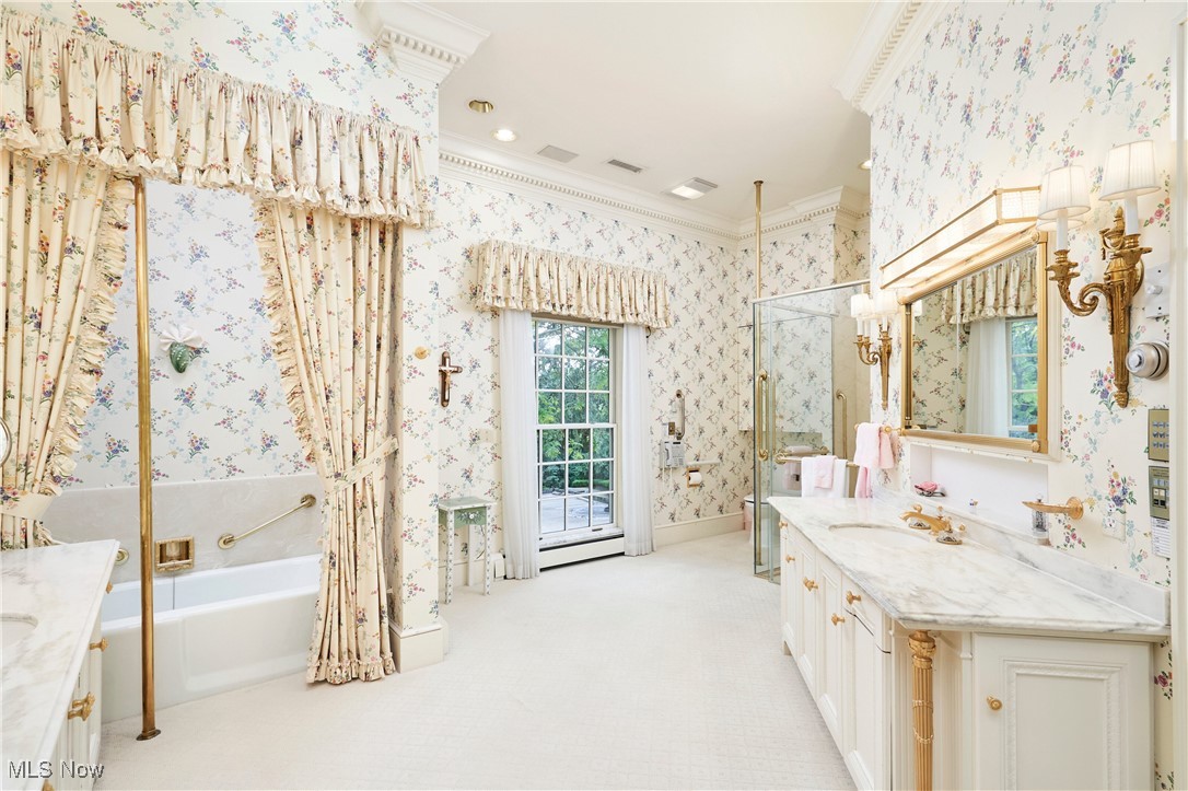 48 South Wheaton Road Akron, OH 44313 - Photo 27 of 48 Sherle Wagner fixtures set an elegant tone for primary bathroom and dressing rooms.