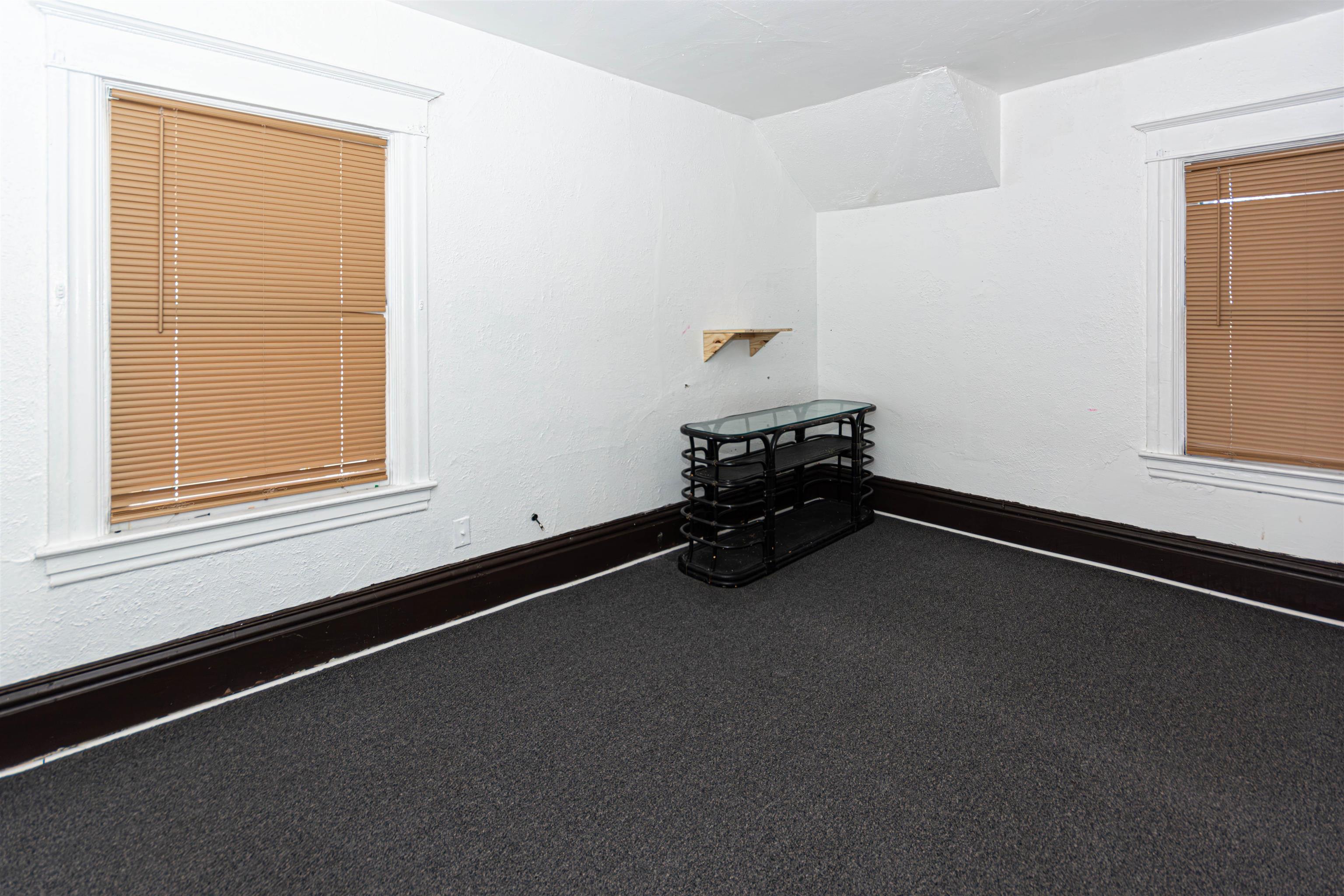 1017 Ridge Avenue Rockford, IL 61103 - Photo 12 of 20 an empty room with windows