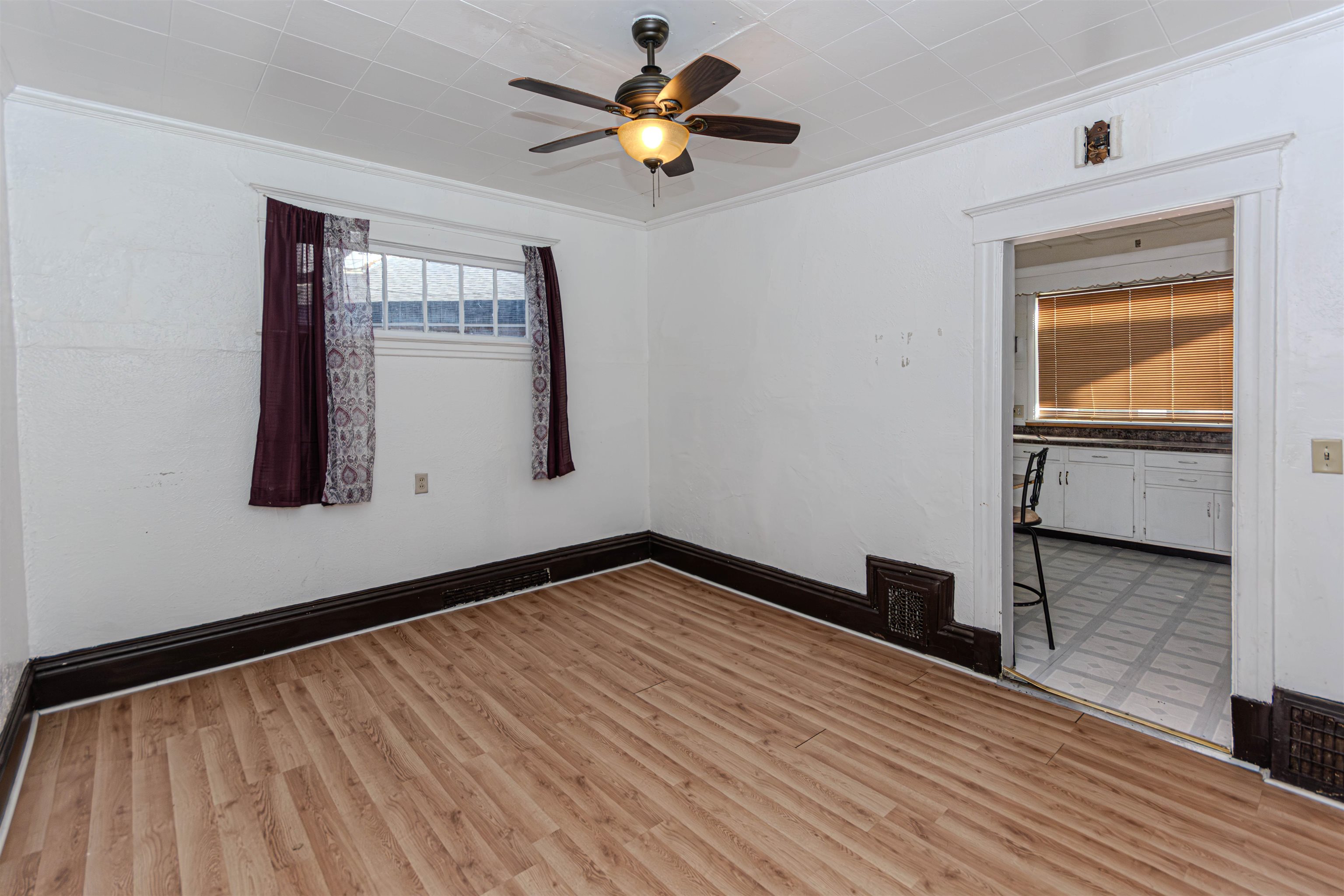 1017 Ridge Avenue Rockford, IL 61103 - Photo 15 of 20 a view of empty room with wooden floor and fan