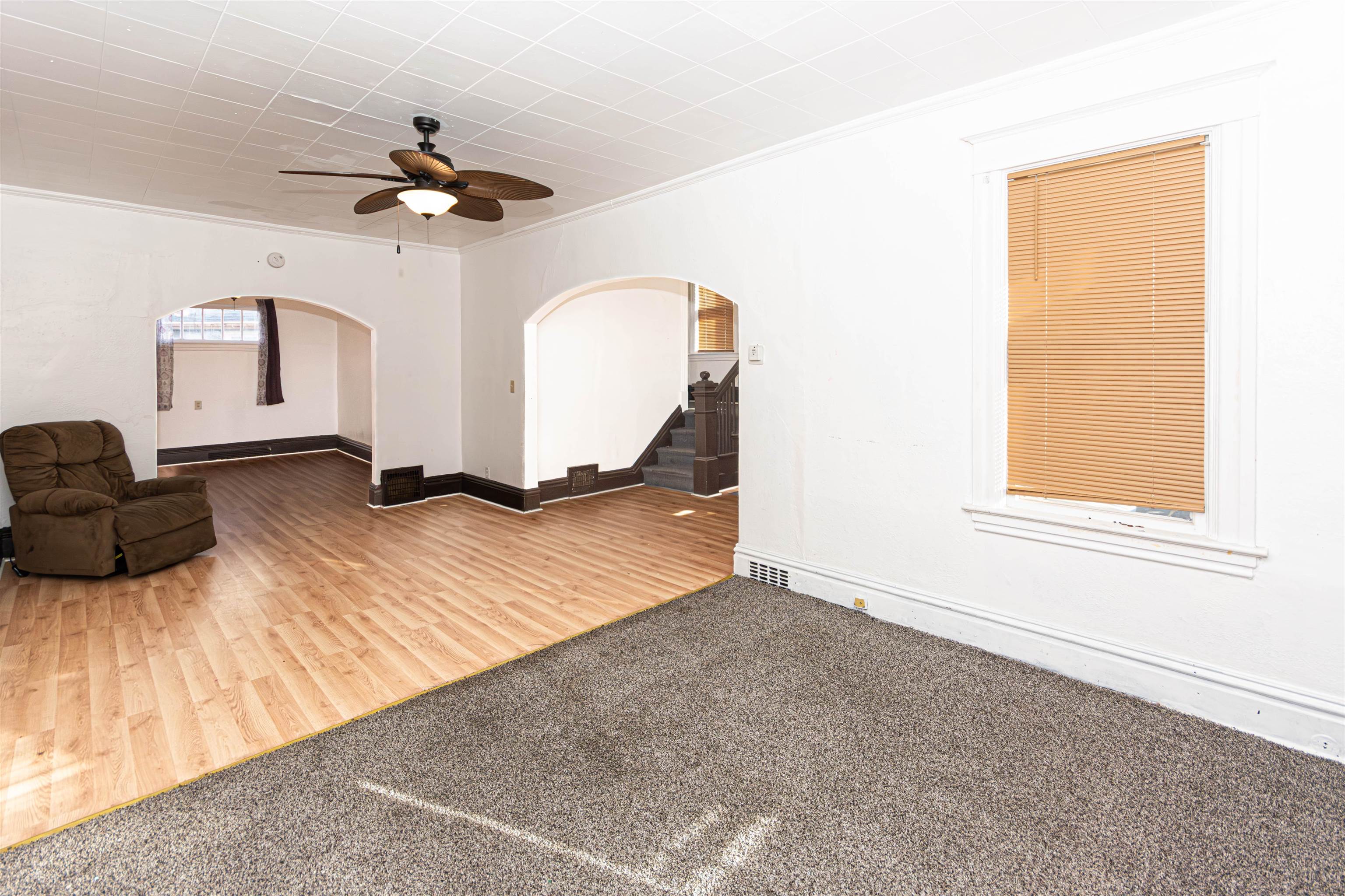 1017 Ridge Avenue Rockford, IL 61103 - Photo 3 of 20 a view of a livingroom with a staircase