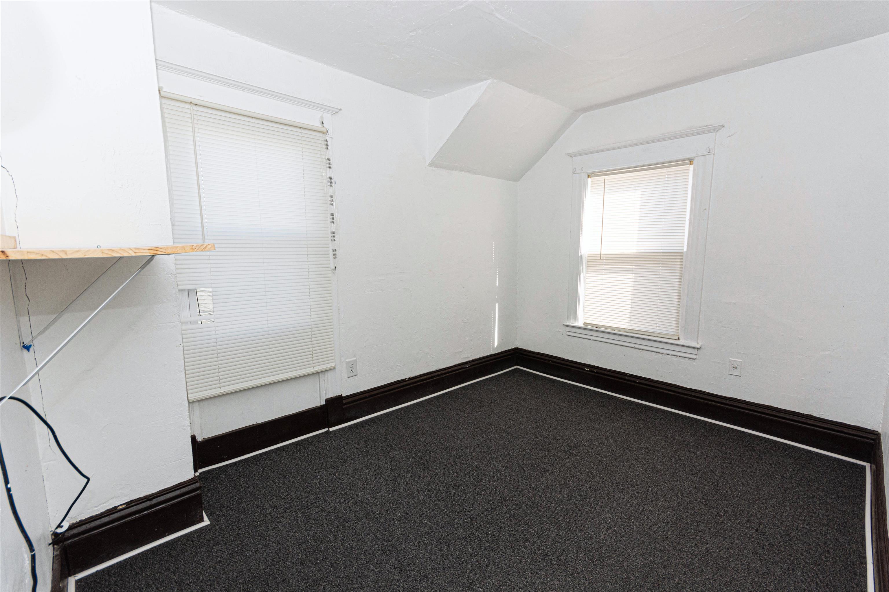 1017 Ridge Avenue Rockford, IL 61103 - Photo 5 of 20 a view of a room with rack on the wall