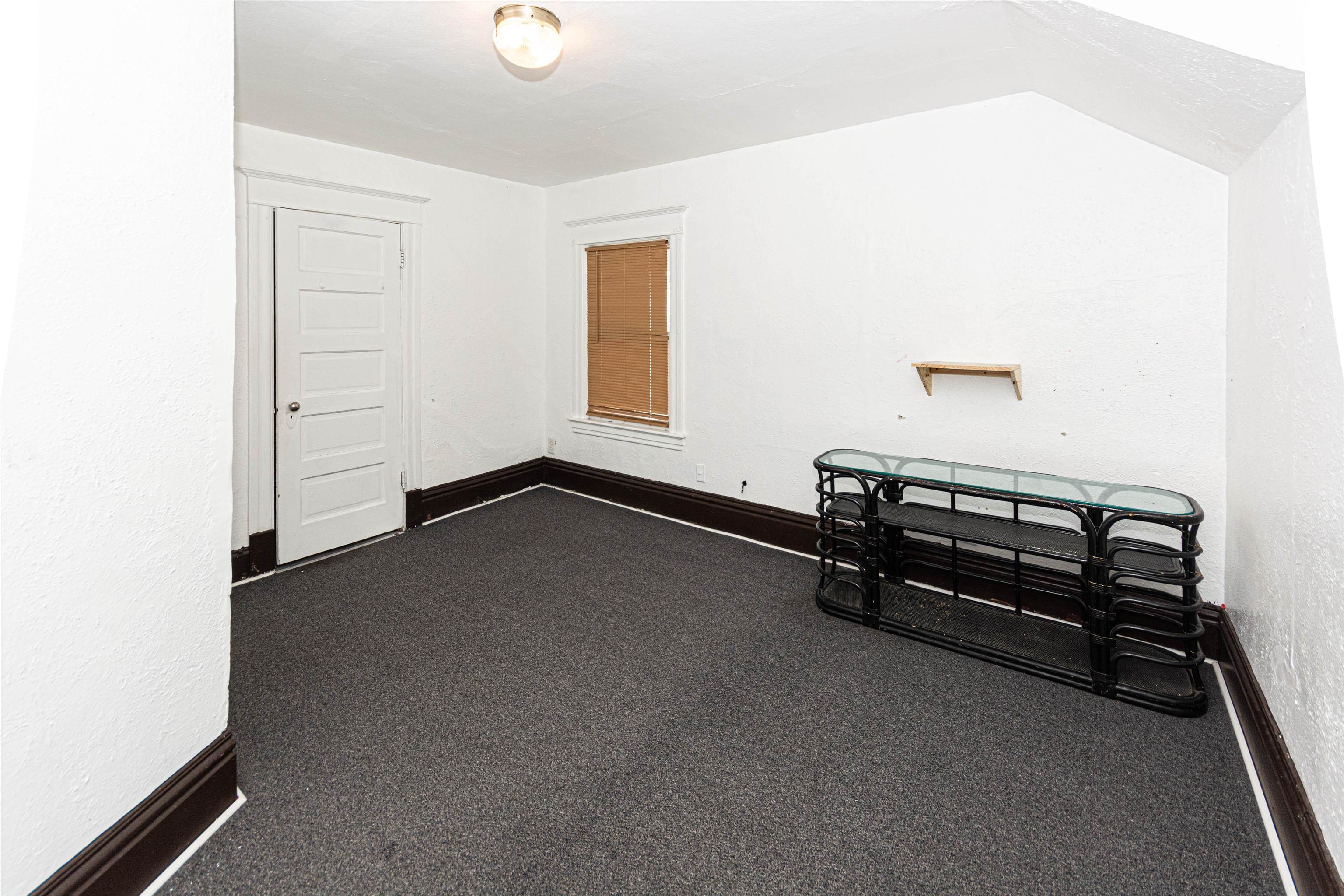 1017 Ridge Avenue Rockford, IL 61103 - Photo 6 of 20 a room with storage and utility