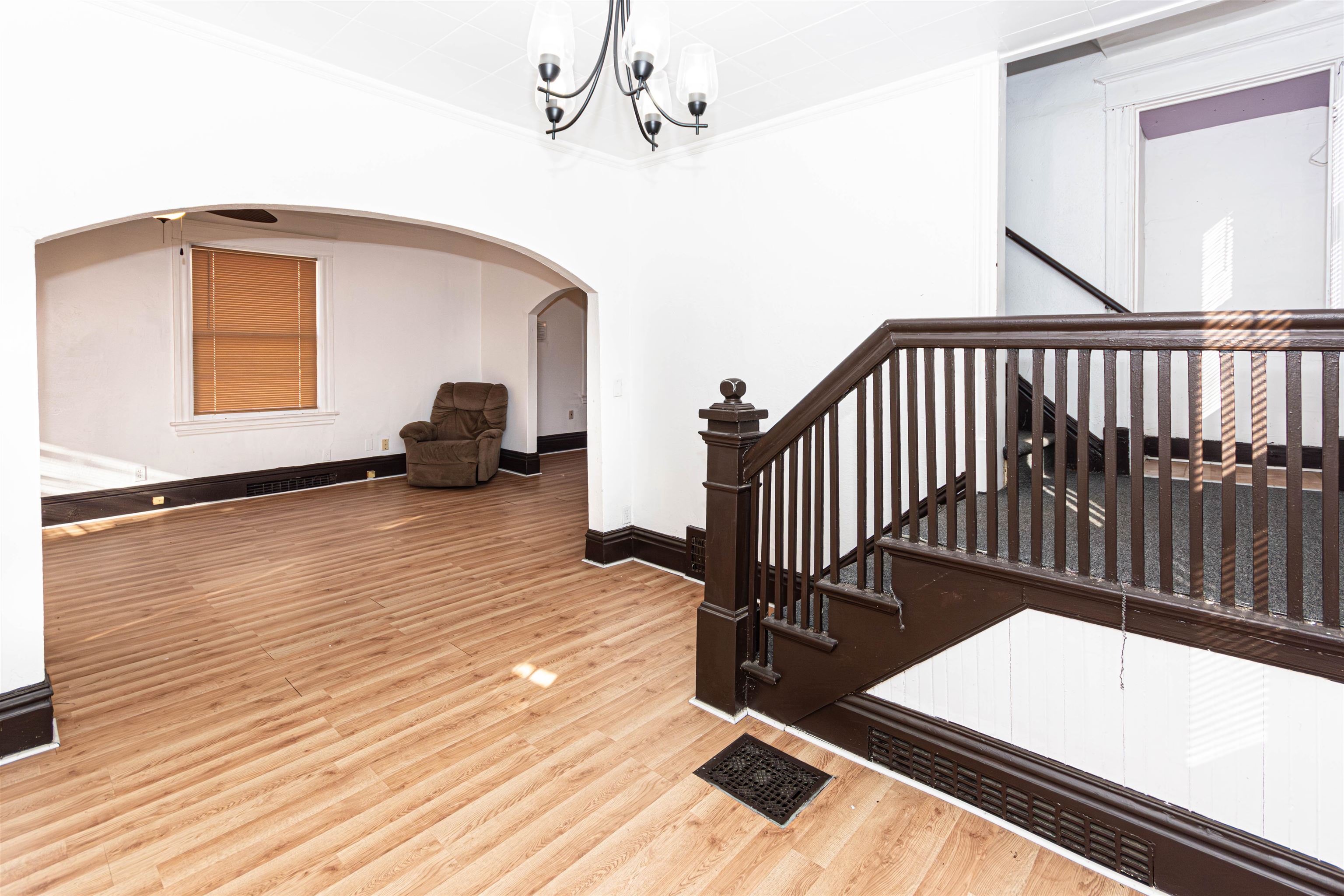 1017 Ridge Avenue Rockford, IL 61103 - Photo 7 of 20 a view of a living room and wooden floor