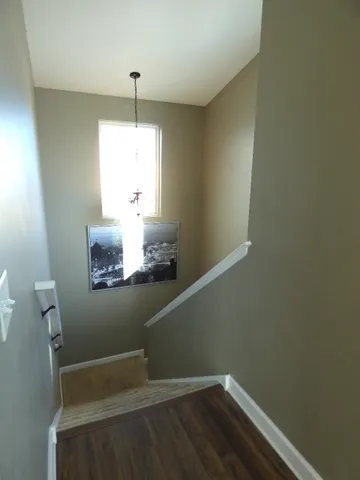 a bathroom with a sink and a window