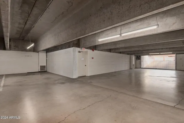 a view of a park with large trees