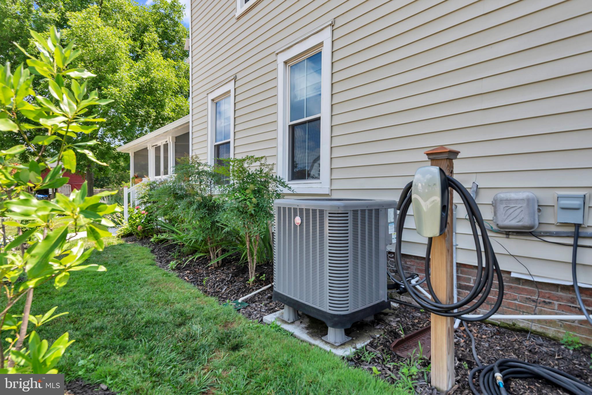 1109 Locust Street Cambridge, MD 21613 - Photo 53 of 67 Side yard- EV charging station