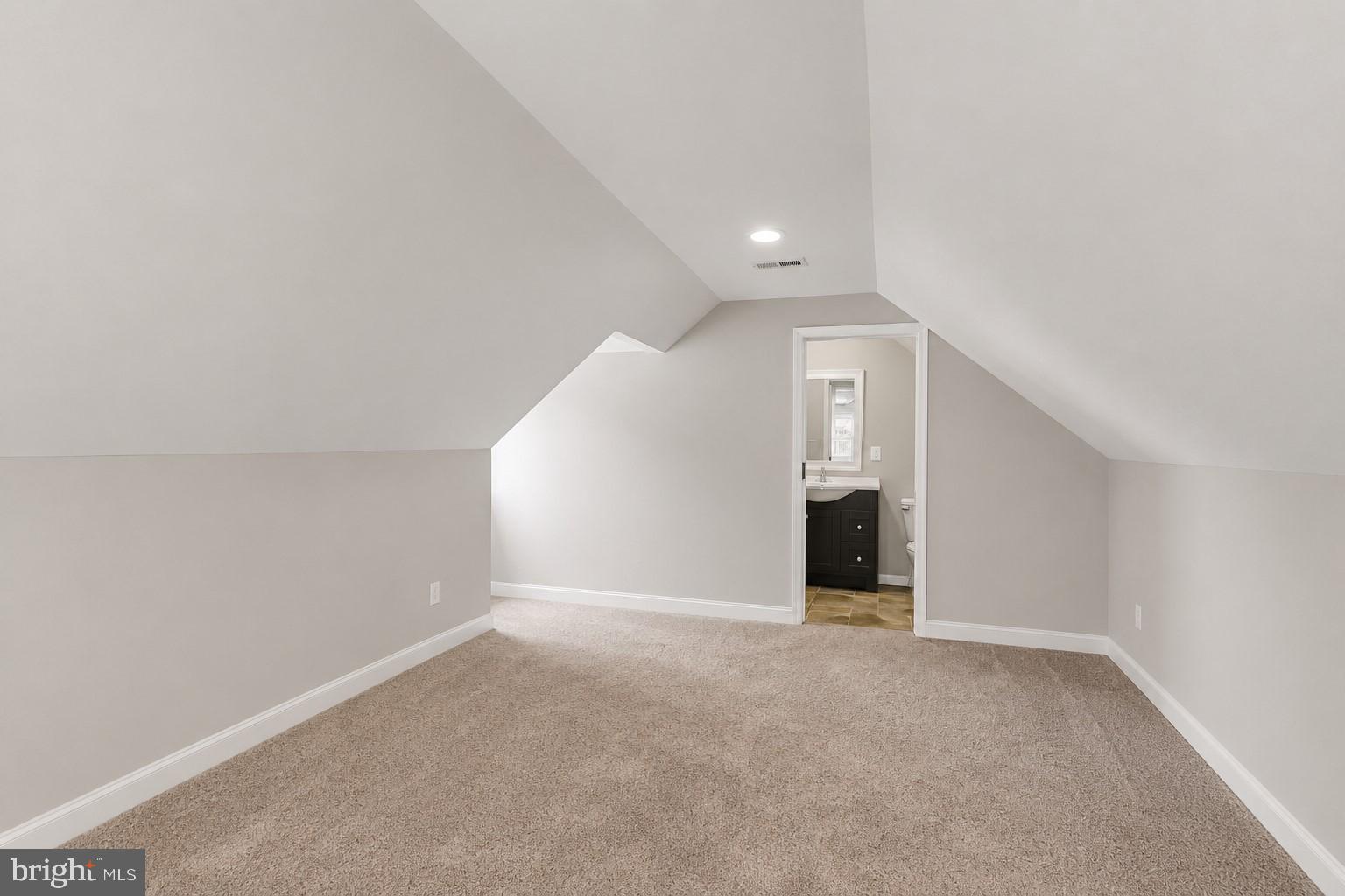 2507 Glencoe Road Baltimore, MD 21234 - Photo 19 of 31 Cozy attic space with modern charm.
