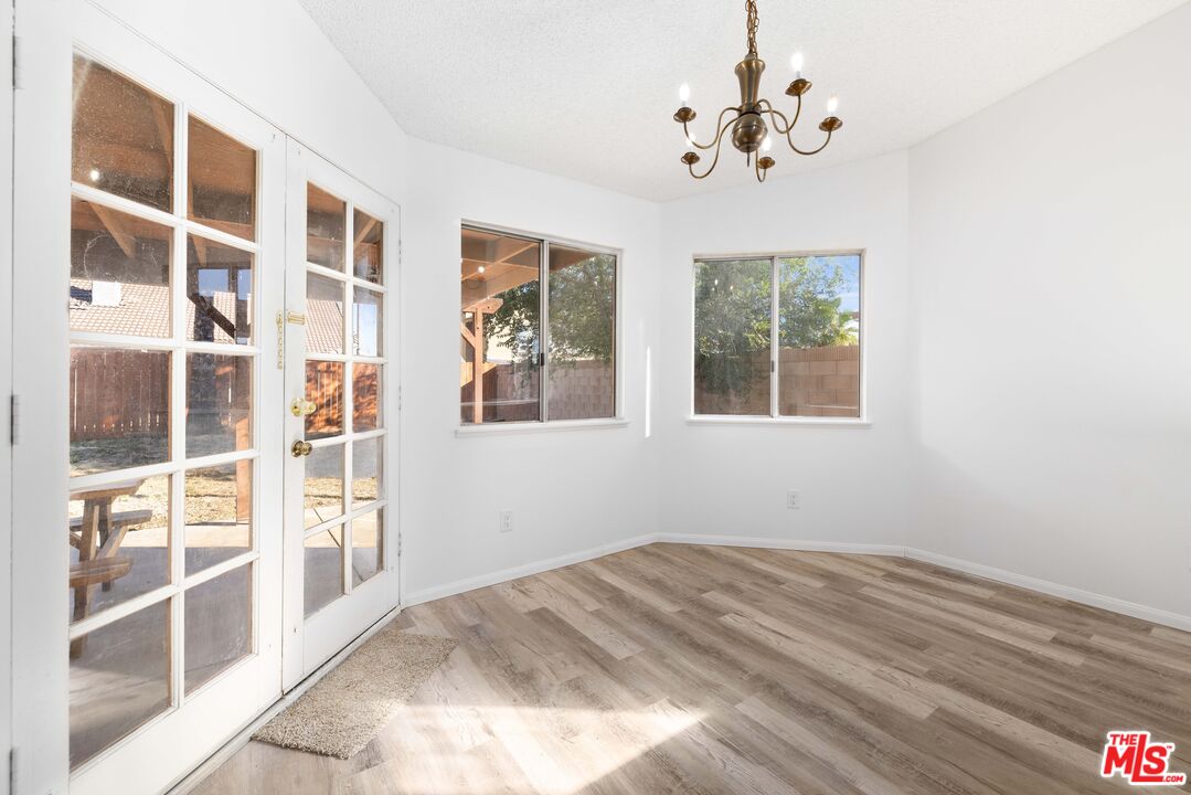 1415 Kings Road Palmdale, CA 93551 - Photo 10 of 27 a view of empty room with windows