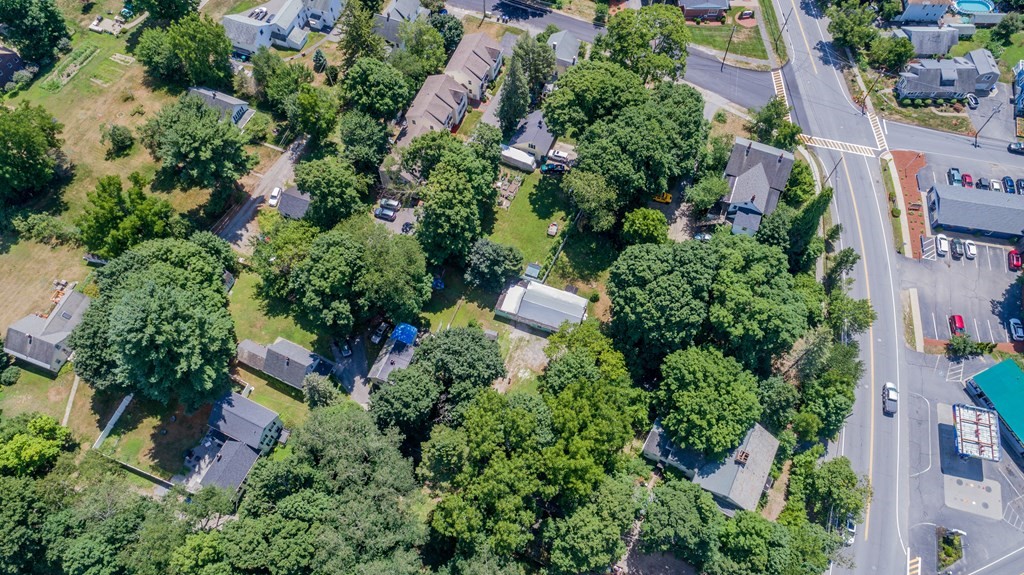 23 Bennett Lane Lancaster, MA 01523 - Photo 3 of 4 an aerial view of residential house with outdoor space and trees all around