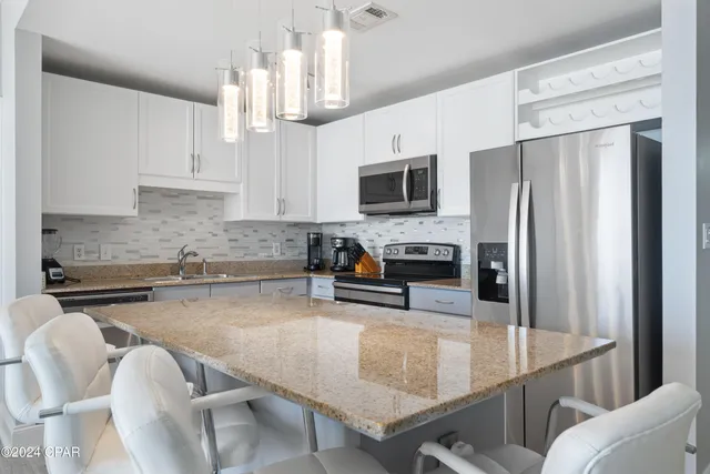 $469,000 | 9860 South Thomas Drive, Unit 1806, Panama City Beach, FL 32408