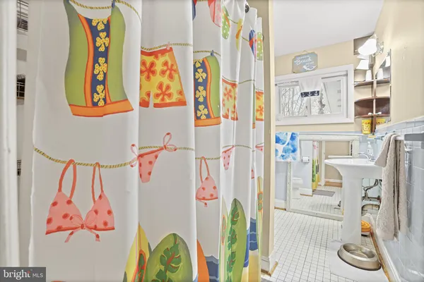 a utility room with dryer washer and other equipment