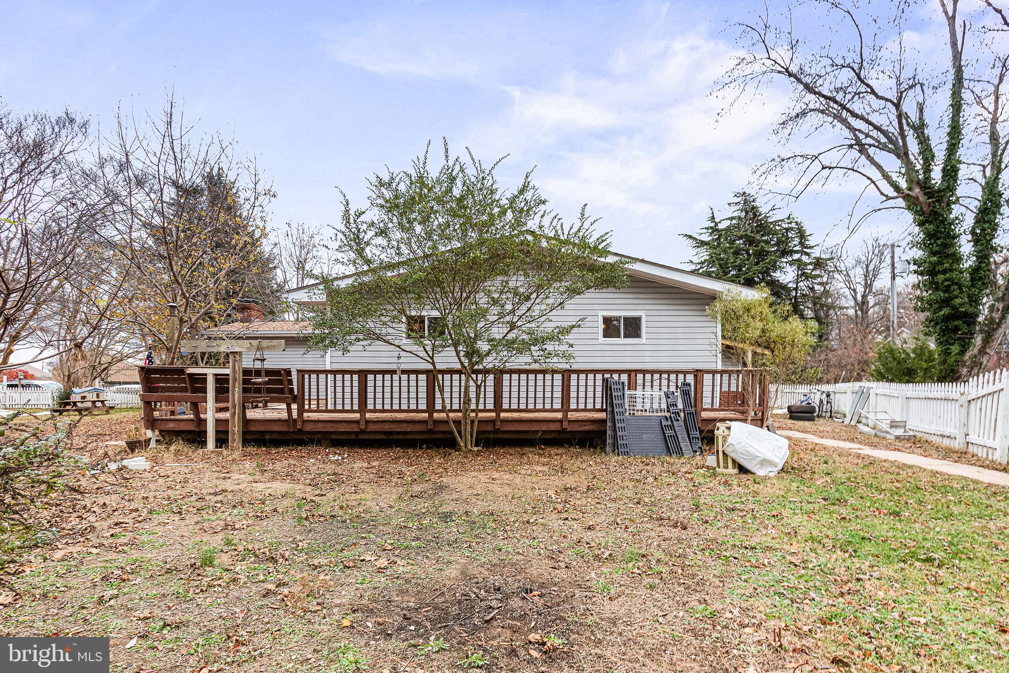 3504 Wakefield Street Colonial Beach, VA 22443 - Photo 34 of 53 front view of a house with a yard and trees