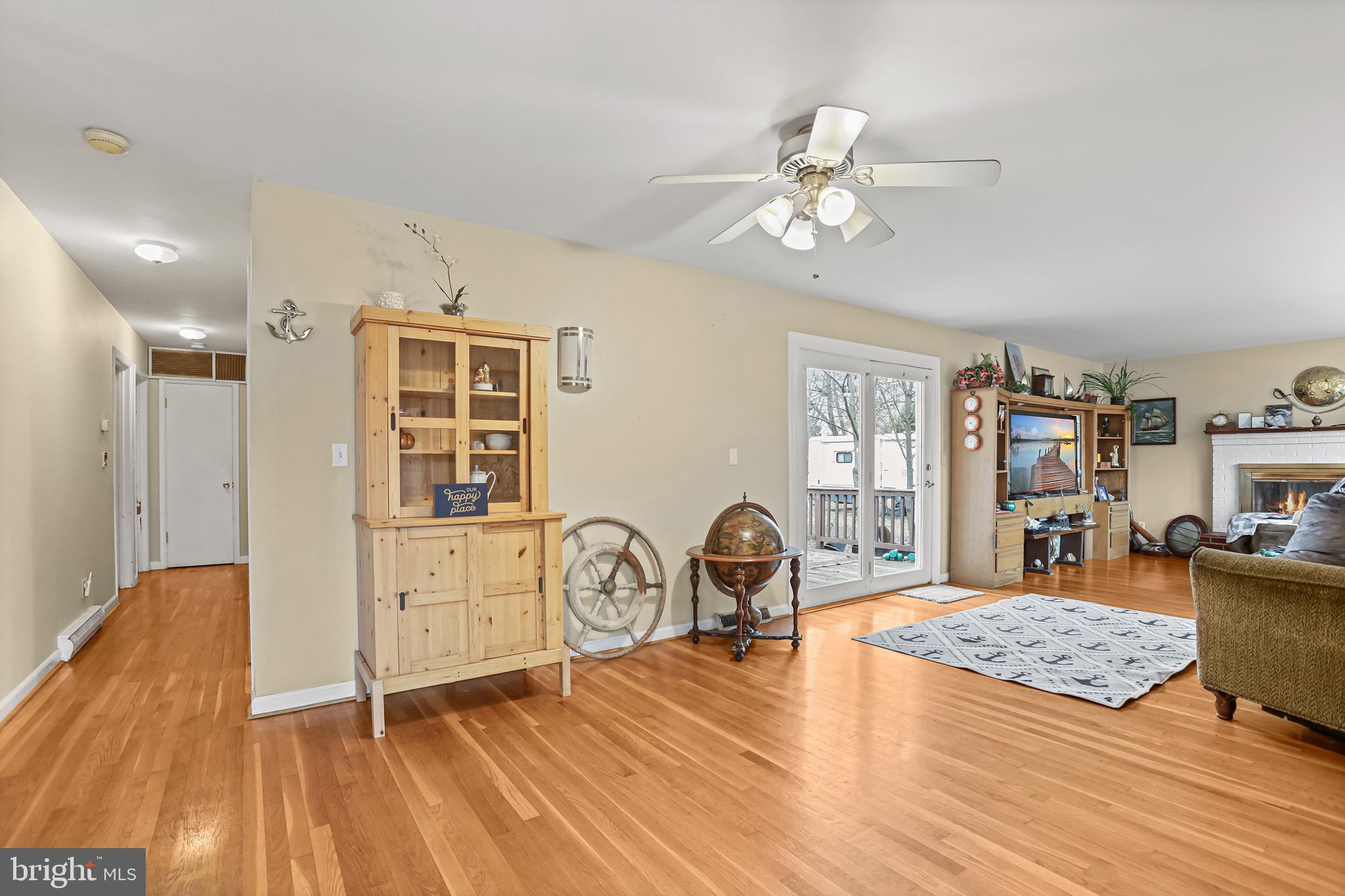 3504 Wakefield Street Colonial Beach, VA 22443 - Photo 8 of 53 a living room with furniture and wooden floor