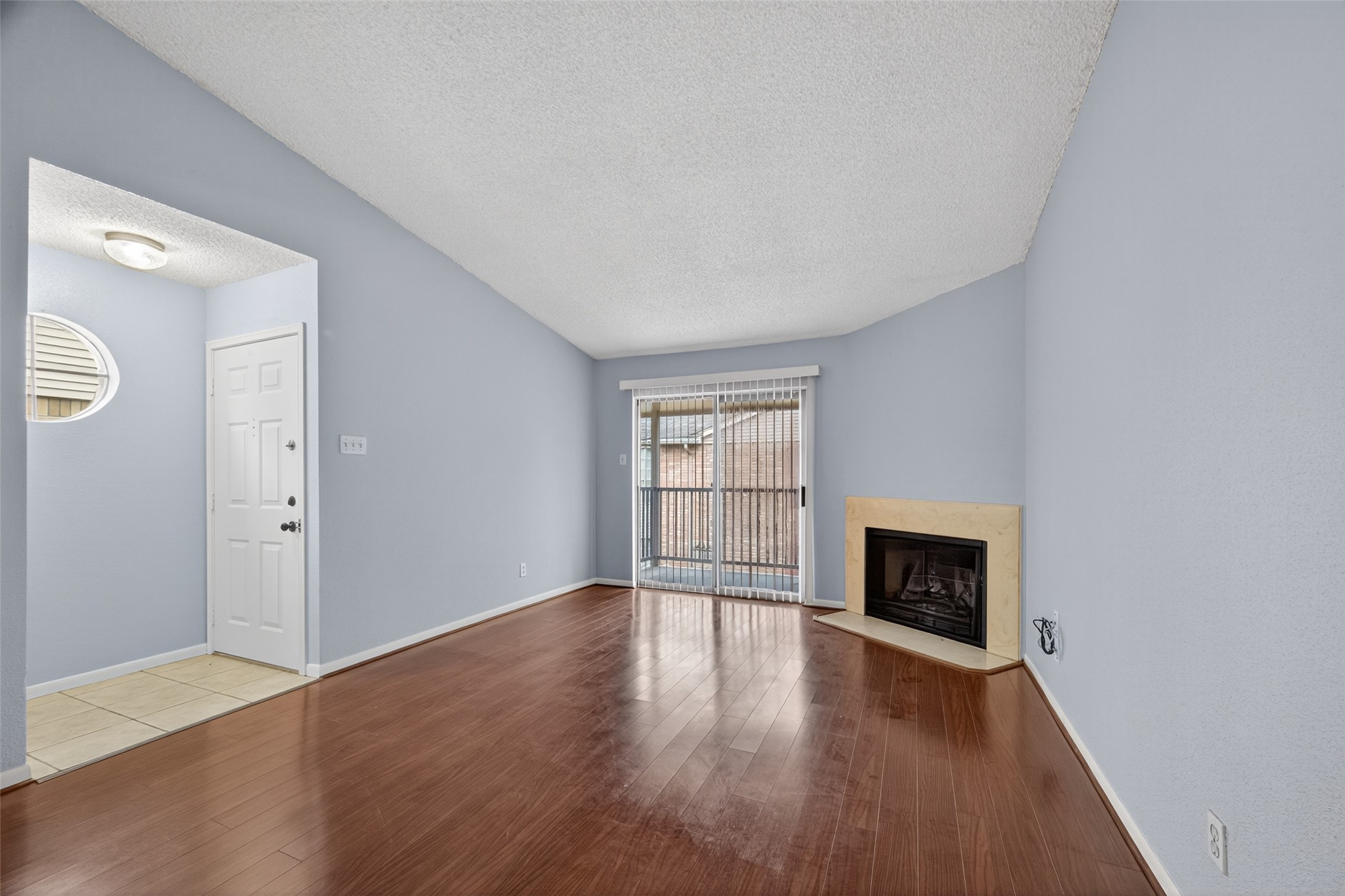 3100 Jeanetta Street, Unit 1104 Houston, TX 77063 - Photo 15 of 25 an empty room with windows and fireplace