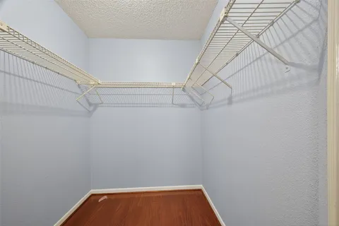 a view of a room with racks on the wall