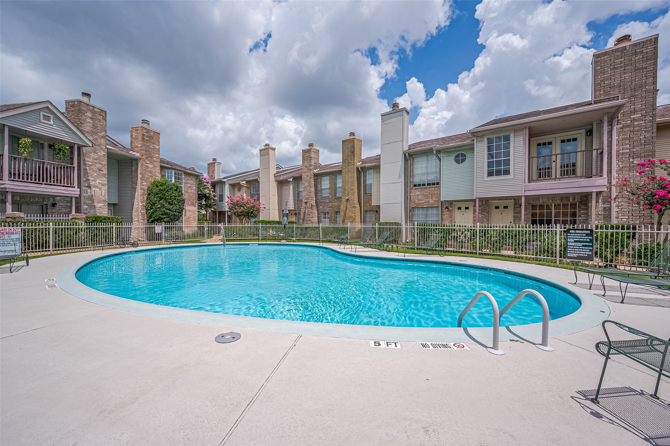 3100 Jeanetta Street, Unit 1104 Houston, TX 77063 - Photo 3 of 25 a view of swimming pool with outdoor seating and plants