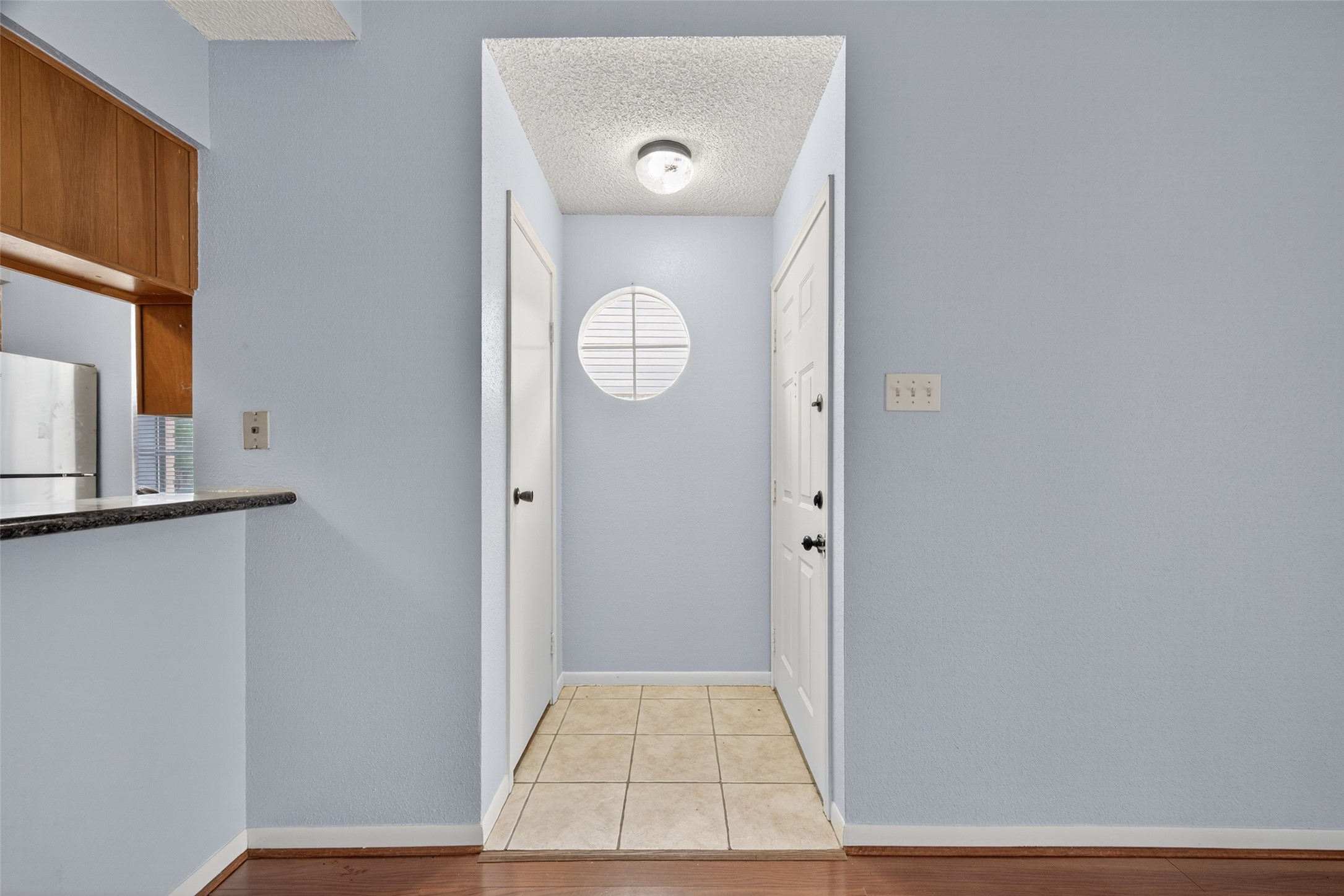 3100 Jeanetta Street, Unit 1104 Houston, TX 77063 - Photo 7 of 25 a view of a livingroom with wooden floor and window