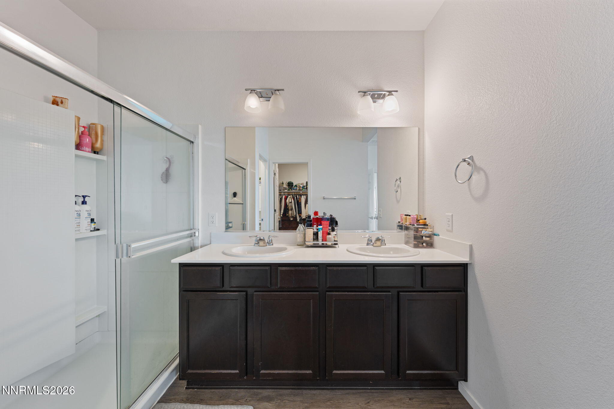 9708 Sea Glass Drive Reno, NV 89506 - Photo 20 of 51 a bathroom with a sink vanity and a mirror
